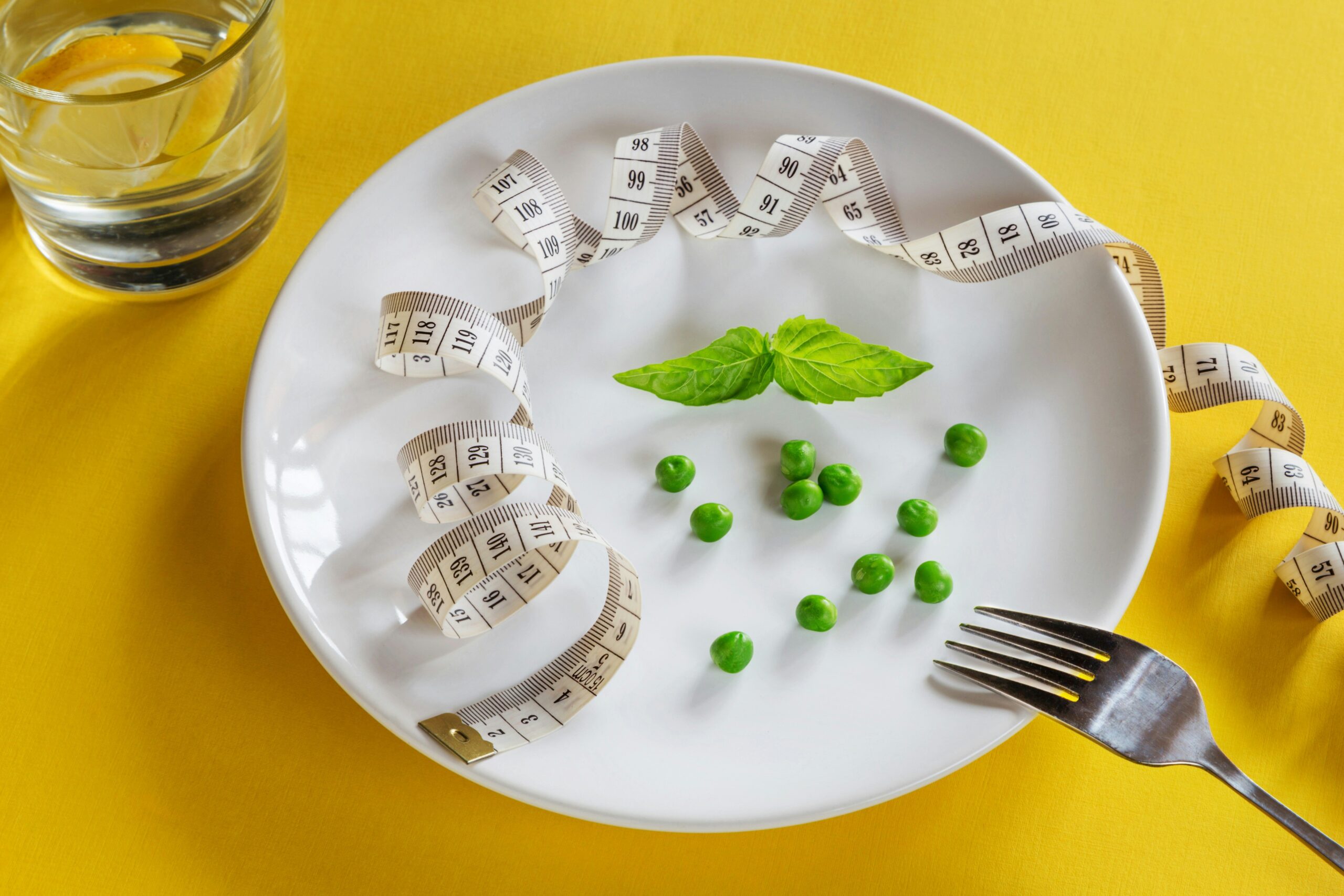 A colorful spread of pre-packaged healthy meals on a dining table.