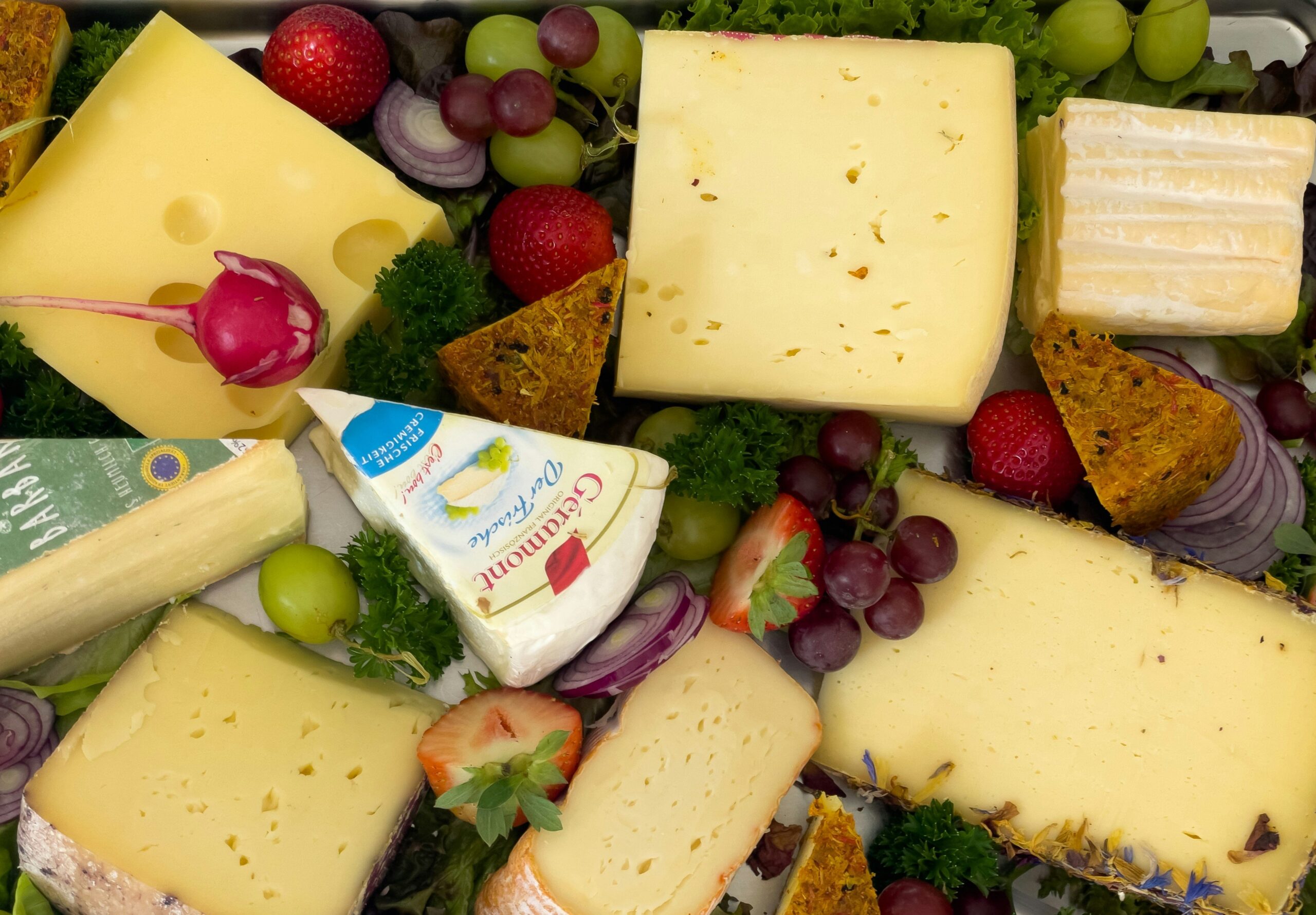 Woman looking confused while holding different healthy food options