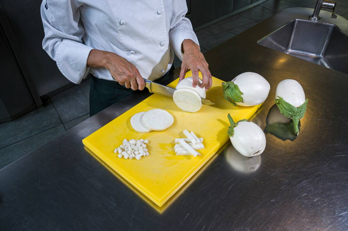 A photo showing neatly packaged meals with clear labels like 'Grilled Chicken with Veggies,' emphasizing convenience.