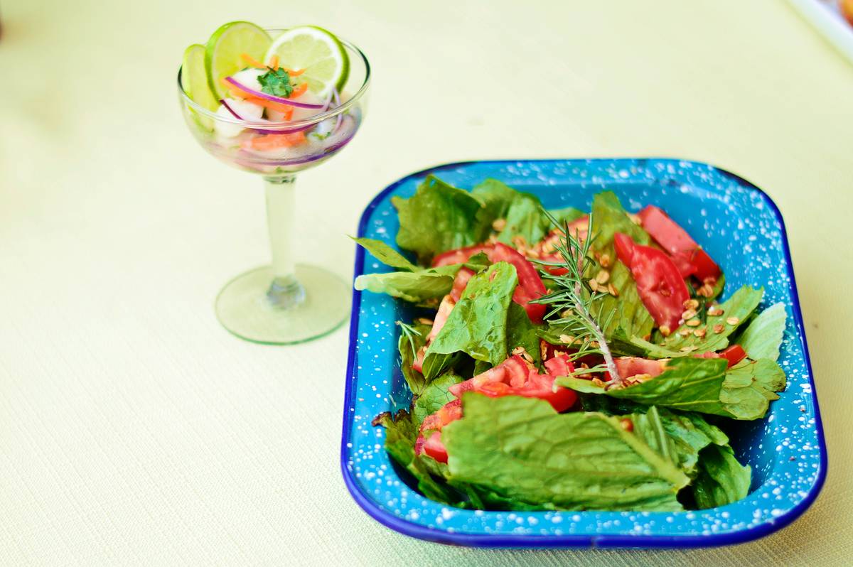 Woman struggling to prepare healthy food in her kitchen